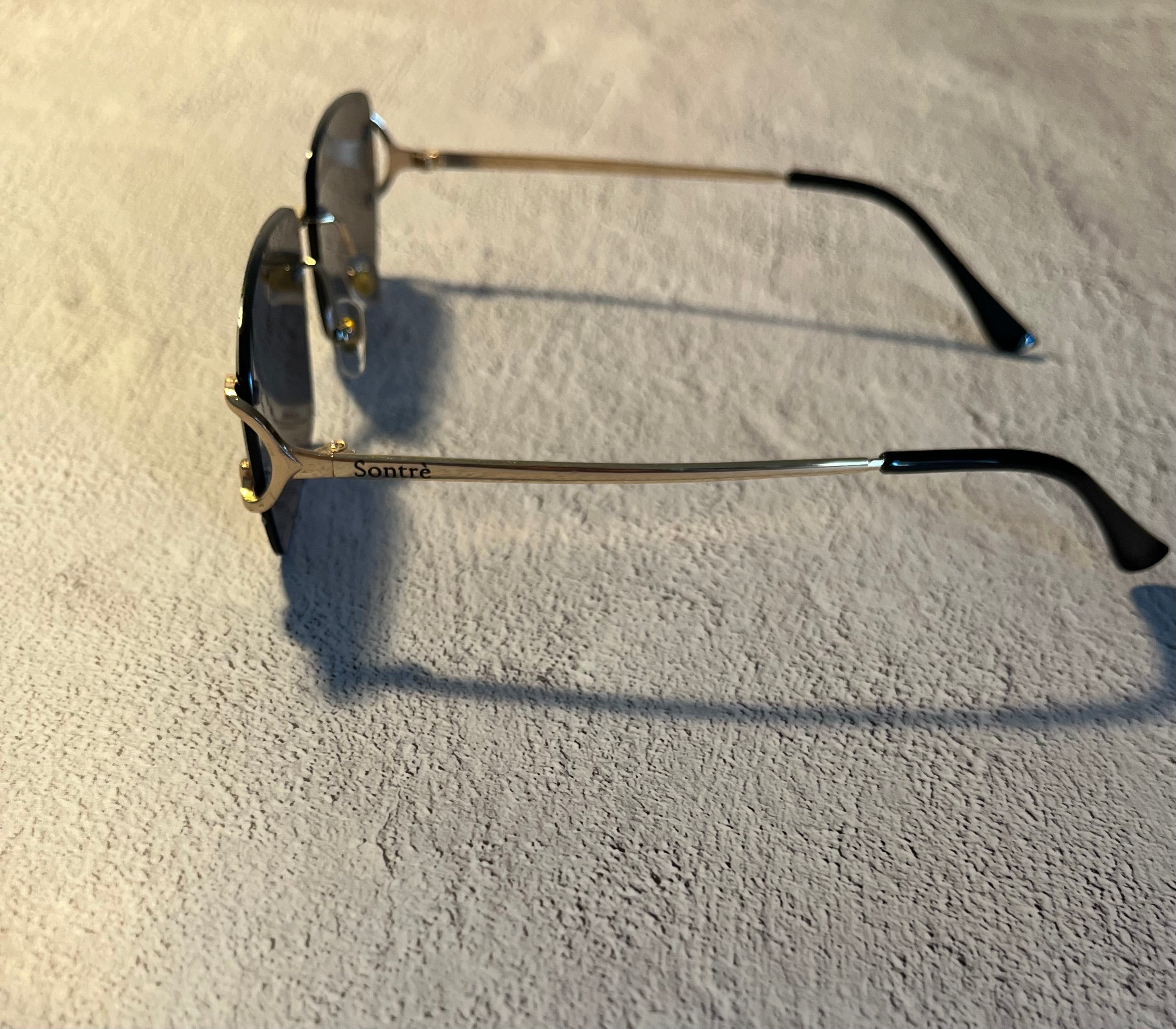 UV400 Diamond Cut Rimless Sunglasses in Black