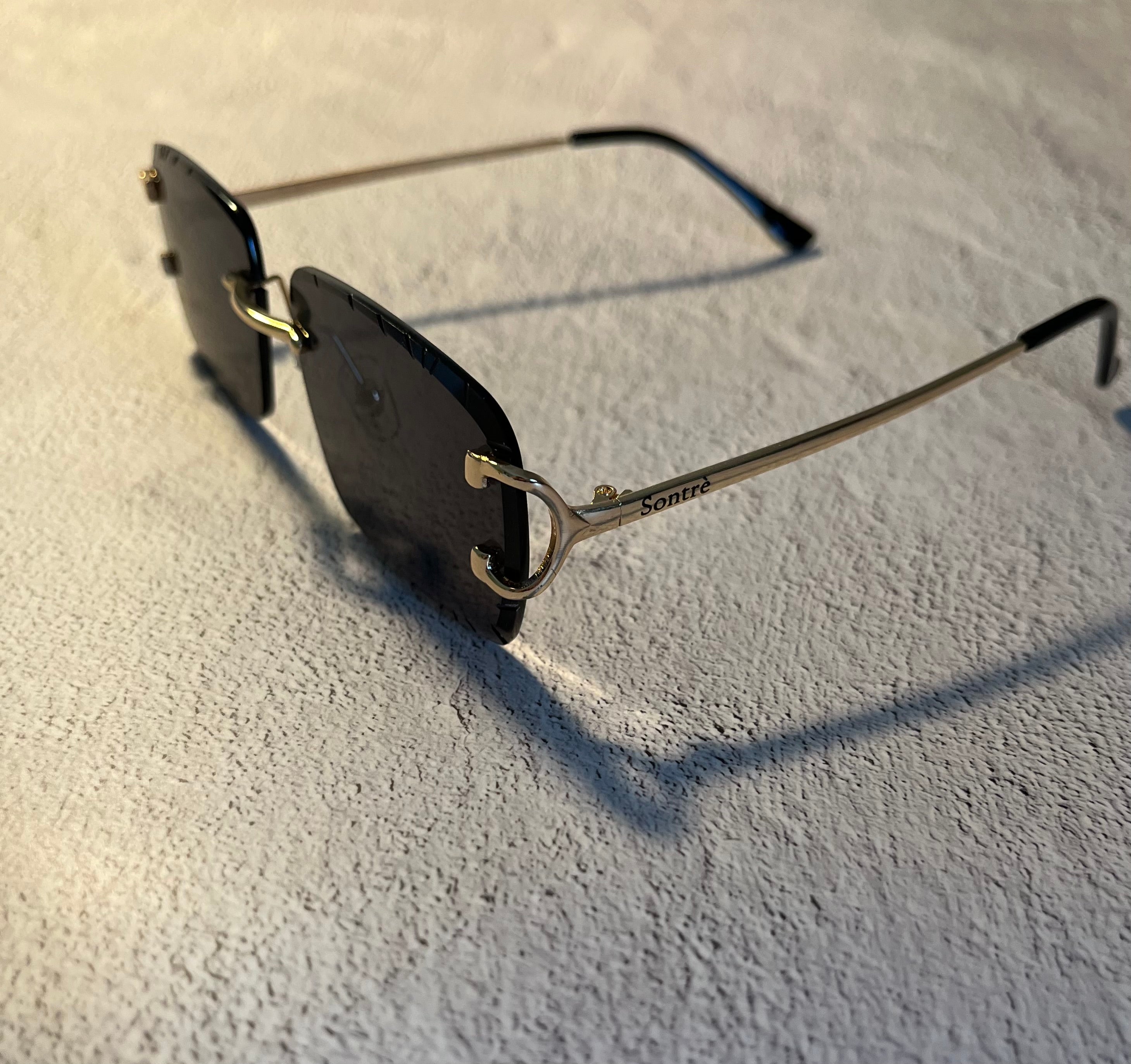 UV400 Diamond Cut Rimless Sunglasses in Black